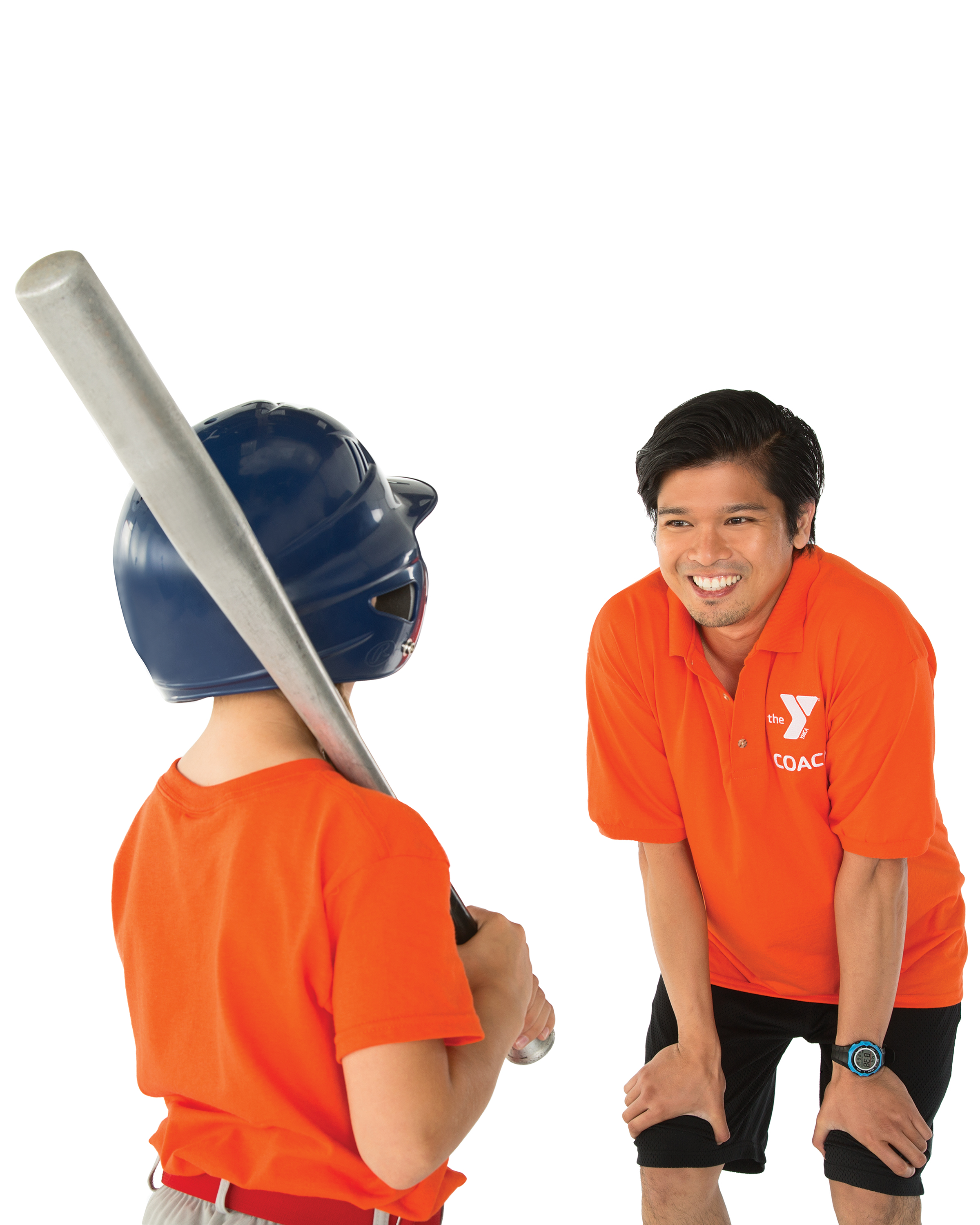A child with his back to the camera holding a baseball bat, a man smiling and giving him instruction