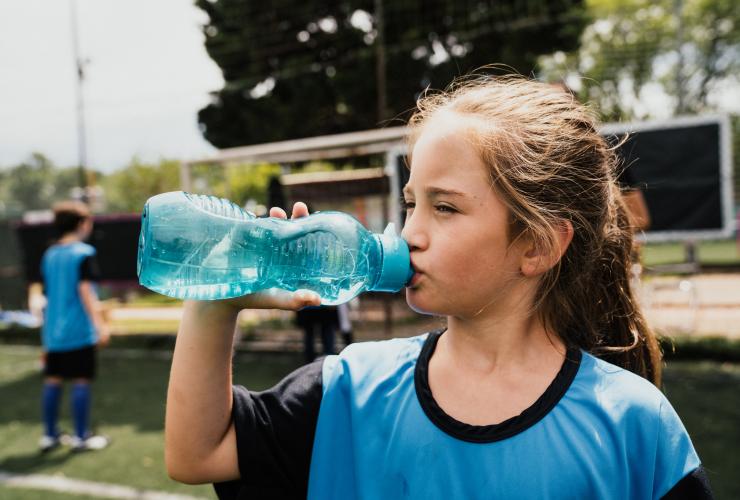 soccer girl drinking water