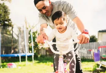 Father and Daughter on a bike