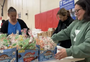 staff packing Christmas boxes for those in need