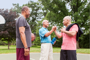 Asian Man with Friends Playing Basketball