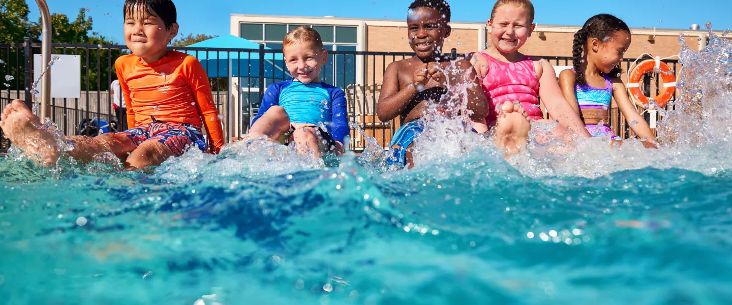 kids splashing in the pool