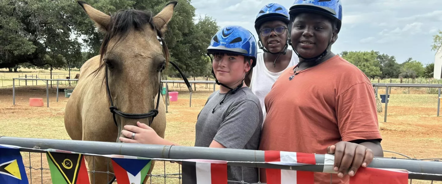 Kamp K'aana - Boys with Horse