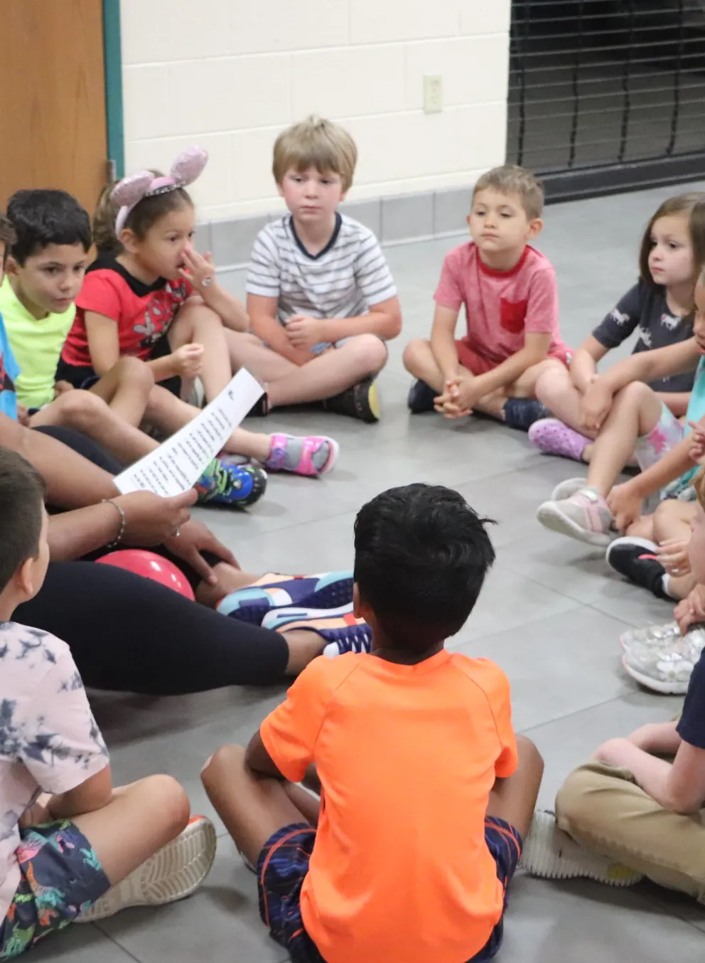 Kids sitting in a circle