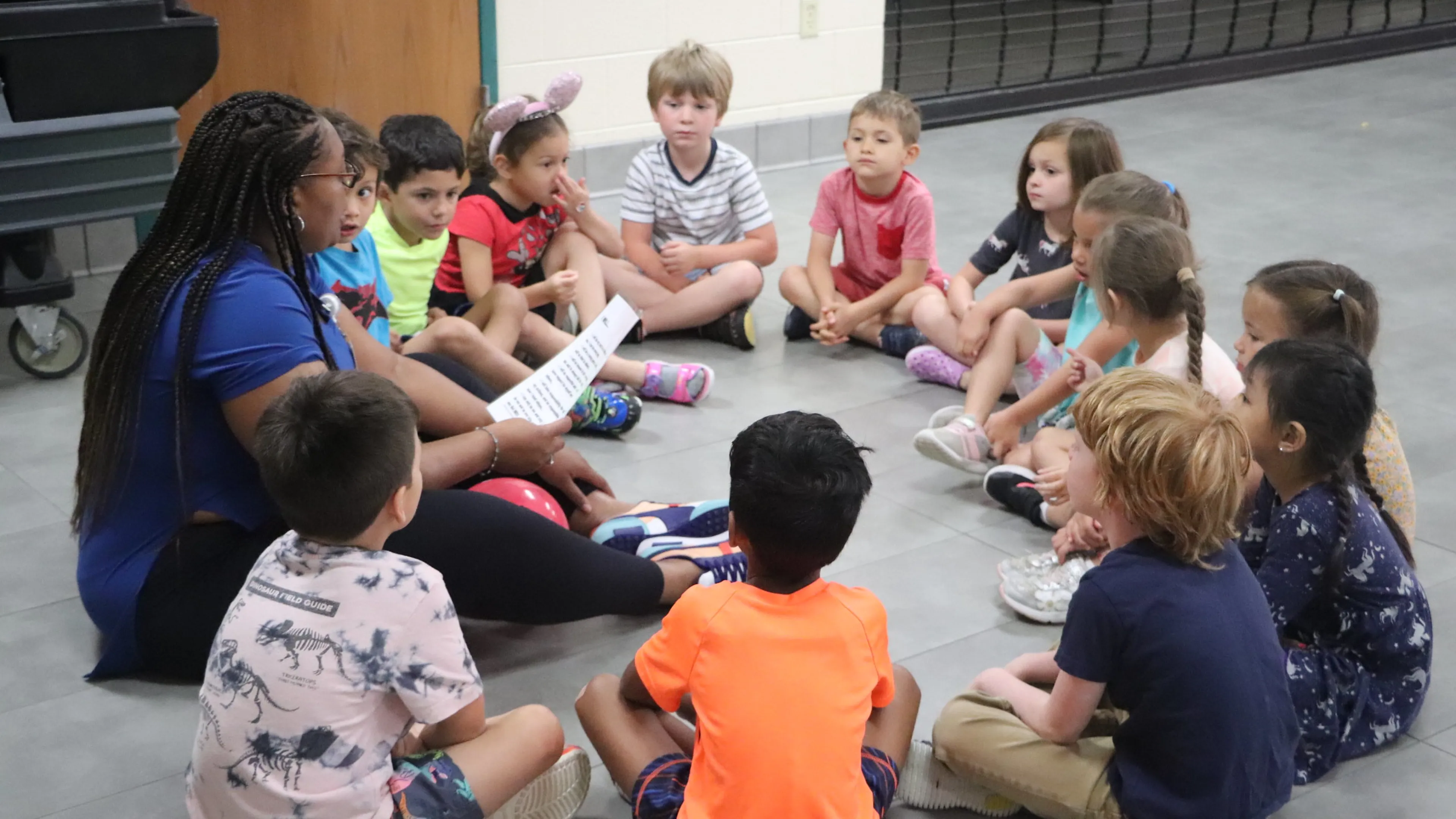 Kids sitting in a circle
