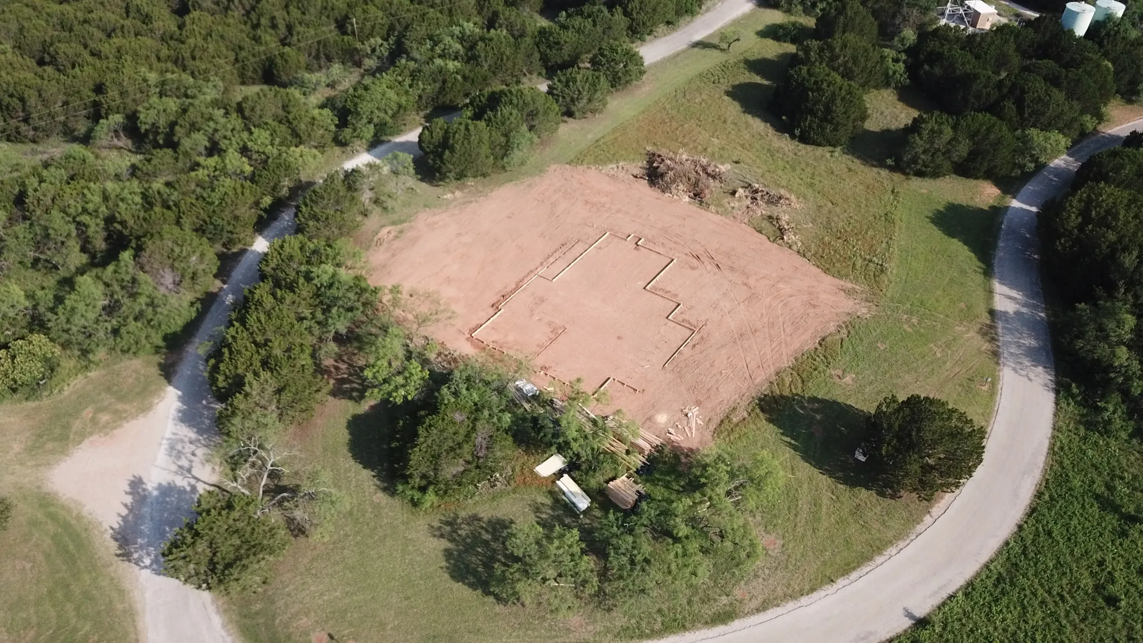 Images of the construction foundation for welcome center at Camp Grady Spruce.