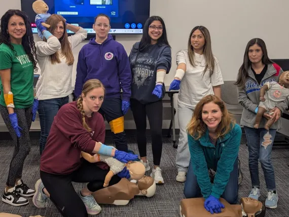 Group posing with the a CRP dummy during training