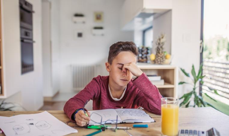 Boy tired of doing math bored