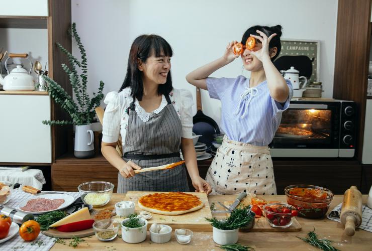 Asian Mom and Girl Cooking