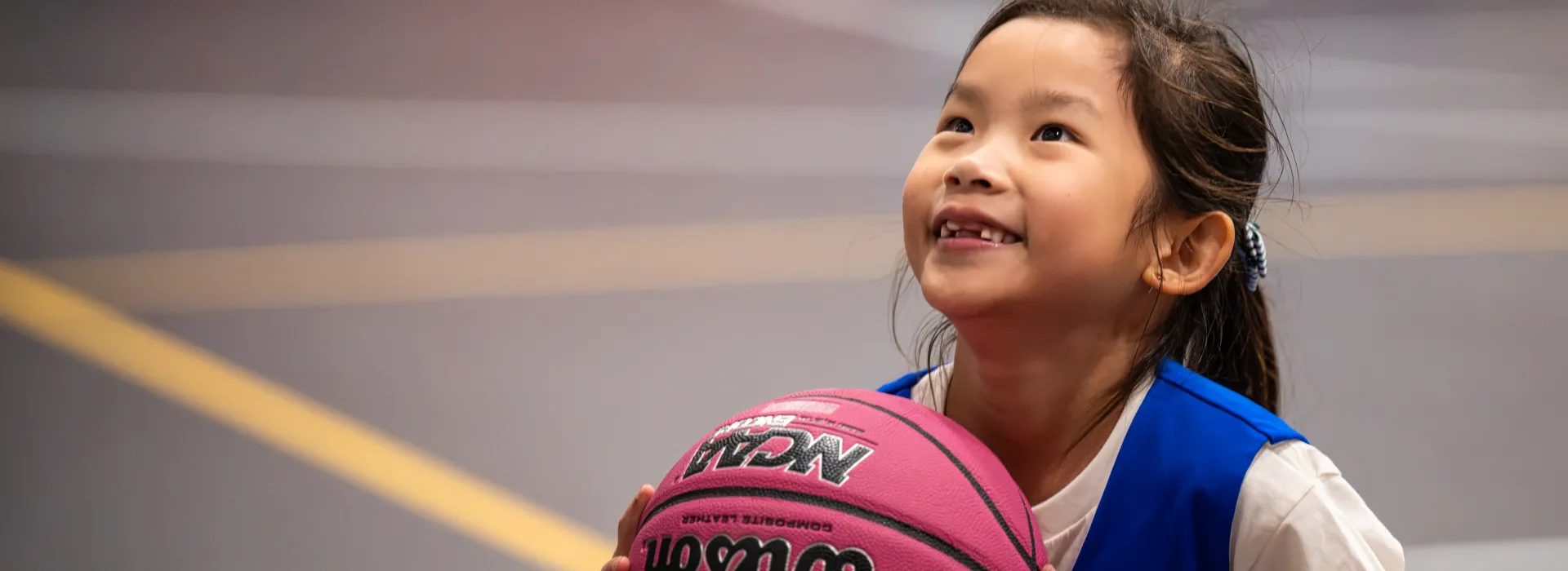 YMCA Youth Basketball member taking a shot