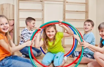 Kids at Rockwall hula hoop activity