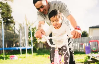 Father and Daughter on a bike