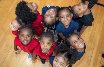 Ariel shot of preschool children posing for a photo
