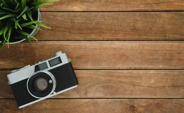 Photo of Camera with wood background