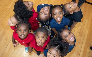 Ariel shot of preschool children posing for a photo