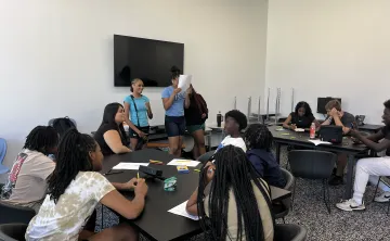 Teens Presenting their Instagram post of preventing smoking