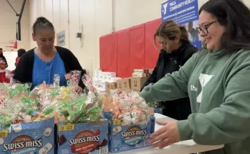 staff packing Christmas boxes for those in need
