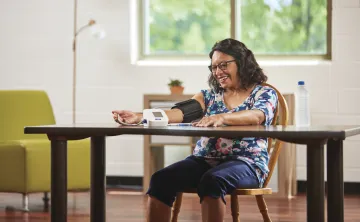 lady checking her blood pressure